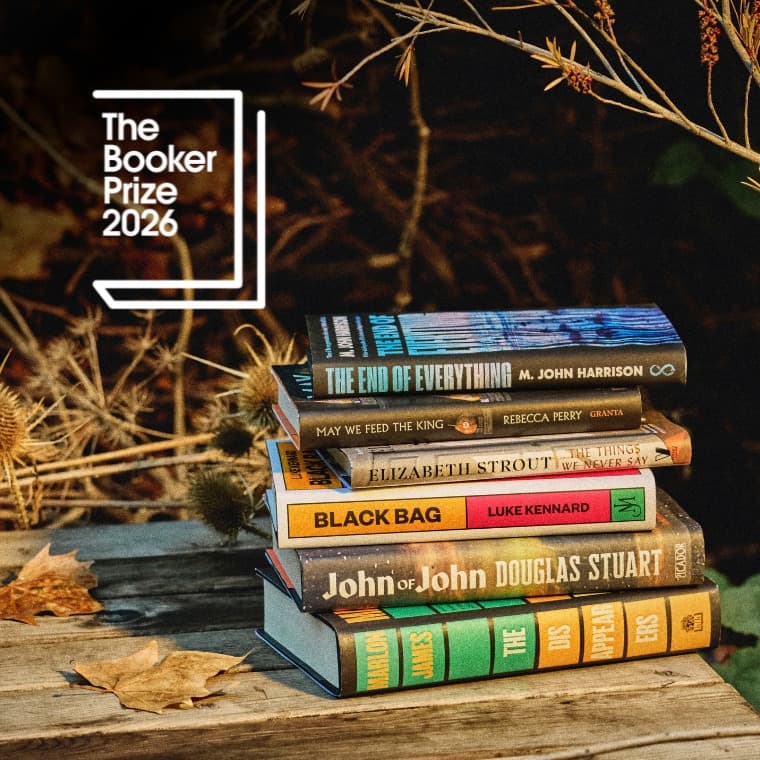 Photograph of the Booker Prize shortlisted titles in an autumnal setting