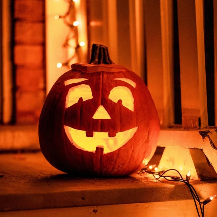 Photo of Halloween jack'o'lantern pumpkin with some fairy lights