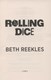 Rolling dice by Beth Reekles