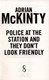 Police at the station and they don't look friendly by Adrian McKinty