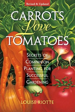 Carrots love tomatoes by Louise Riotte
