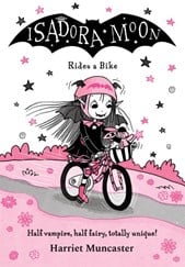Isadora Moon rides a bike